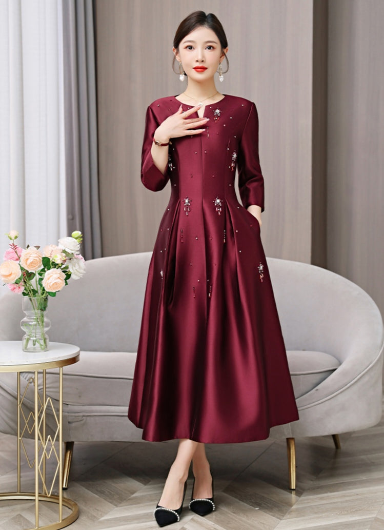 Elegant Burgundy Midi Dress with Beaded Details